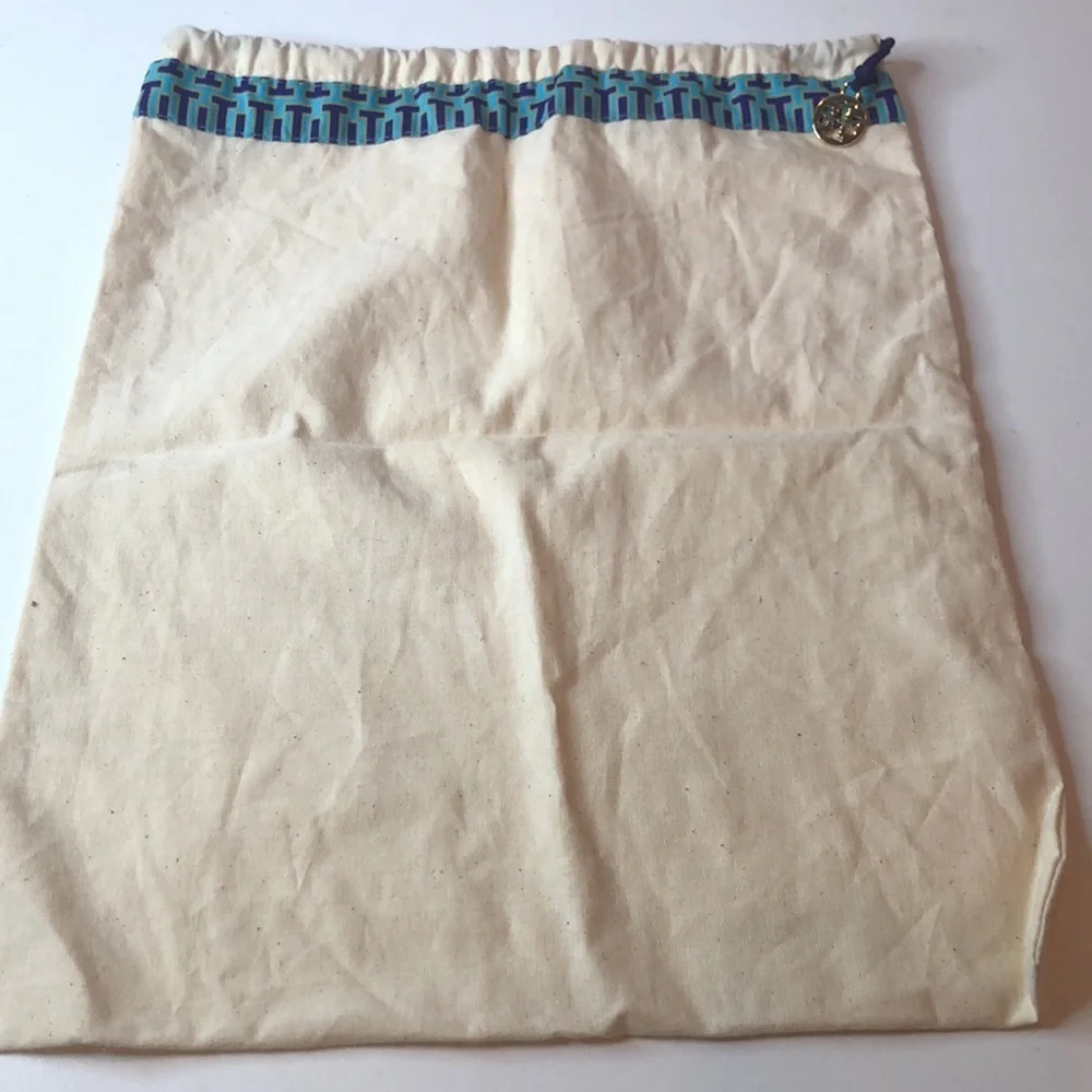 Tory Burch Cream Dust Cover Bag blue accent fabric. Linen look. Gold tone charm